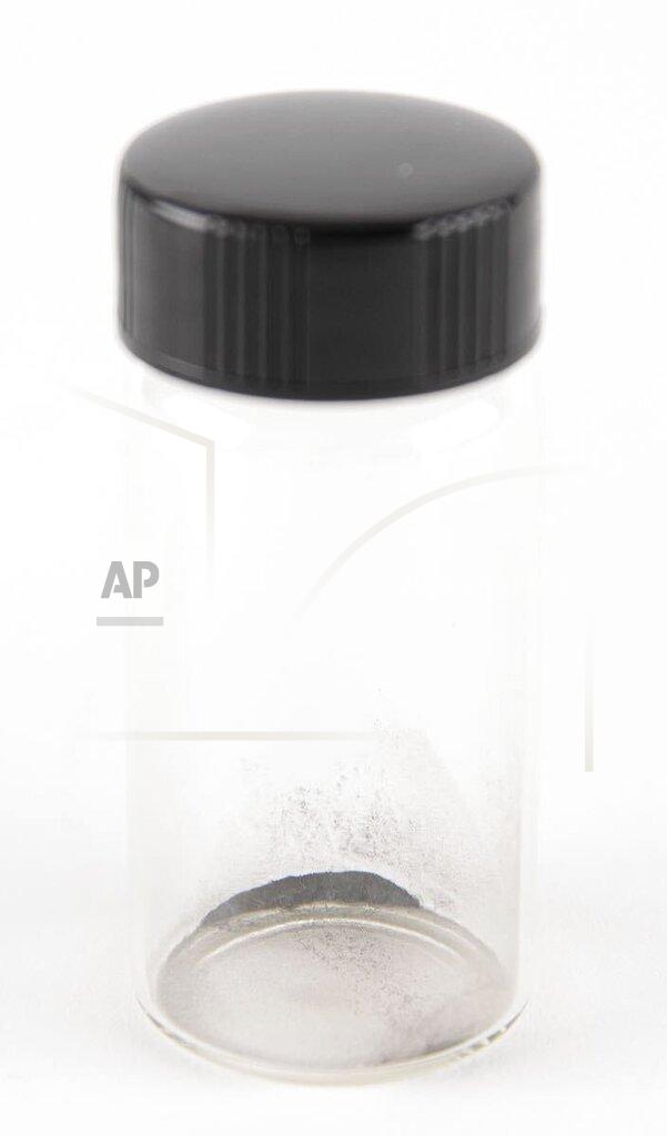 Nikki Brickett/Rr Auction Photo Via Ap This April 2022 handout photograph provided by RR Auction shows moon dust in a vial from the 1969 Apollo 11 mission, which was pulled from an auction listing after NASA said the dust, and some cockroaches that were fed the dust, are property of the federal government. (Nikki Brickett/RR Auction photo via AP)