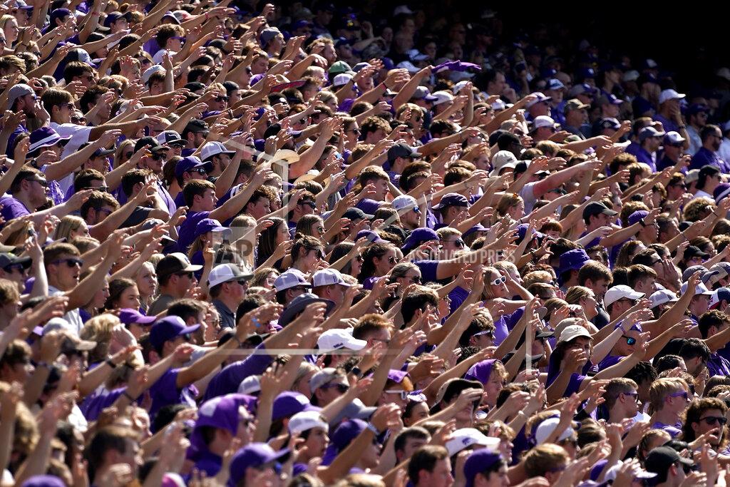 Charlie Riedel Kansas State fans cheer during the first half of an NCAA college football game against Nevada Saturday, Sept. 18, 2021, in Manhattan, Kan. (AP Photo/Charlie Riedel)