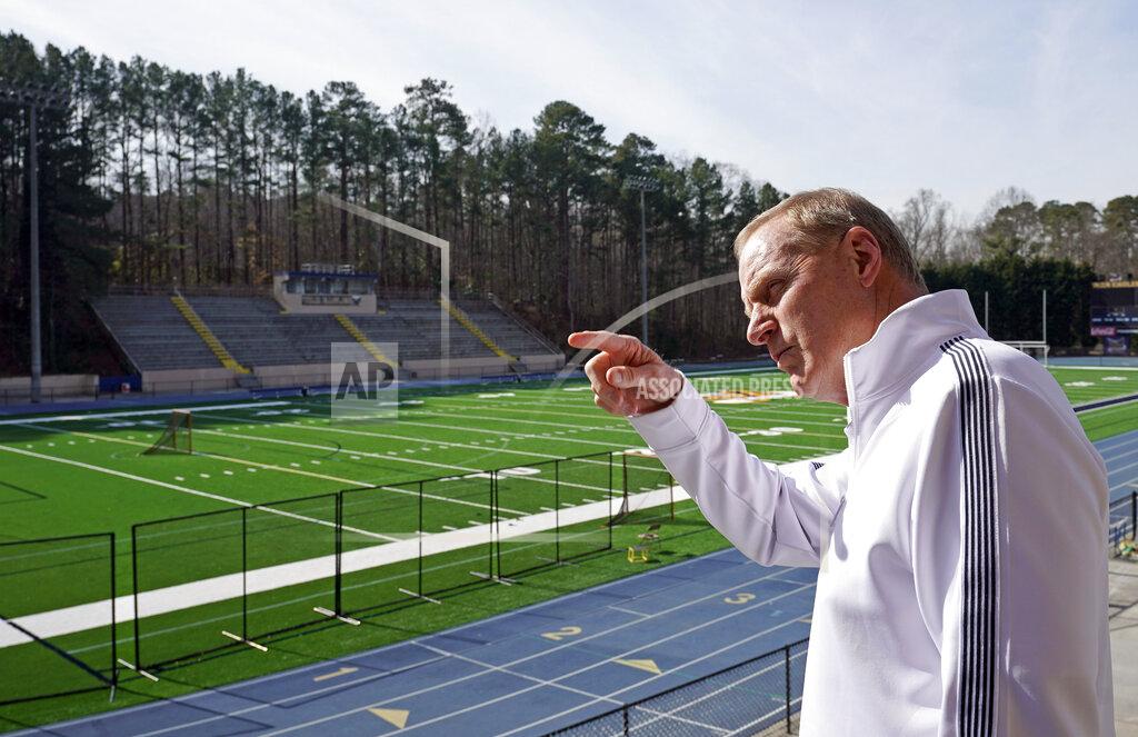 David J. Phillip Marist School football coach Alan Chadwick talks about Los Angeles Rams coach Sean McVay's high school career at Marist during an interview for the NFL Super Bowl 53 football game Friday, Feb. 1, 2019, in Atlanta. McVay was the starting quarterback his senior year at Marist when the team won the state championship in 2003. (AP Photo/David J. Phillip)