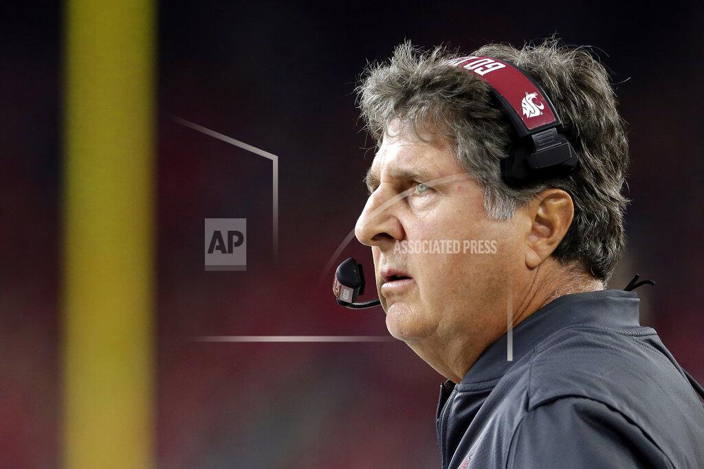 Michael Wyke FILE - In this Sept. 13, 2019, file photo, Washington State head coach Mike Leach watches during the second half of an NCAA college football game against Houston, in Houston. Two people with knowledge of the decision says Mississippi State has hired Washington State's Mike Leach as its new head coach. The people spoke to The Associated Press on condition of anonymity Thursday, Jan. 9, 2020, because the school has not yet officially announced the move. Leach will replace Joe Moorhead, who was fired last week after two seasons. (AP Photo/Michael Wyke, File)