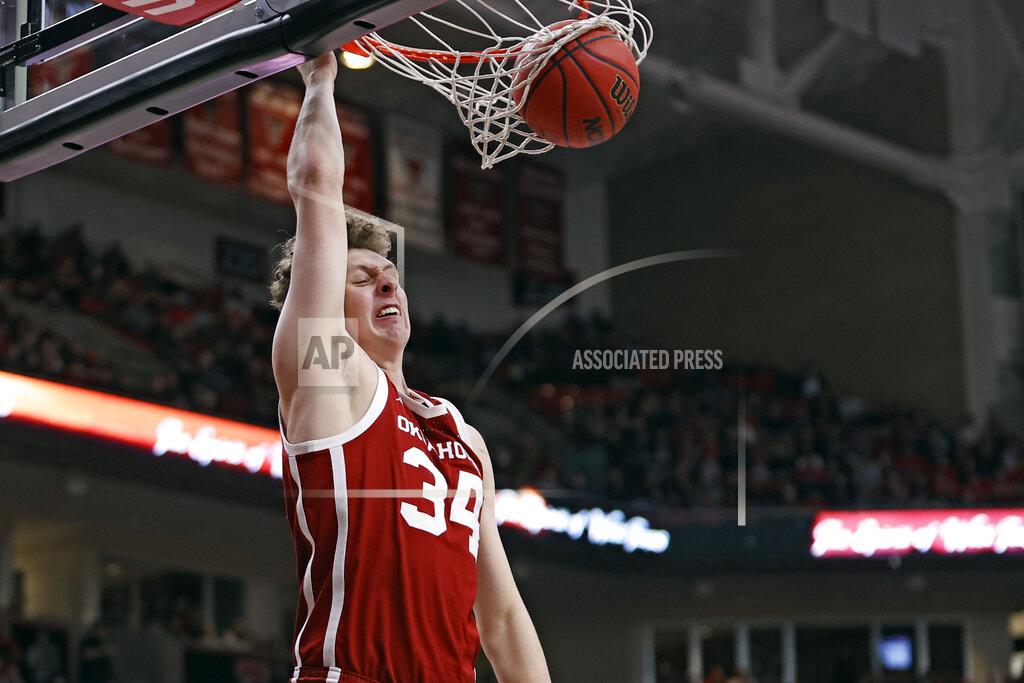 Brad Tollefson Oklahoma's Jacob Groves dunks during the first half of the team's NCAA college basketball game against Texas Tech, Tuesday, Feb. 22, 2022, in Lubbock, Texas. (AP Photo/Brad Tollefson)
