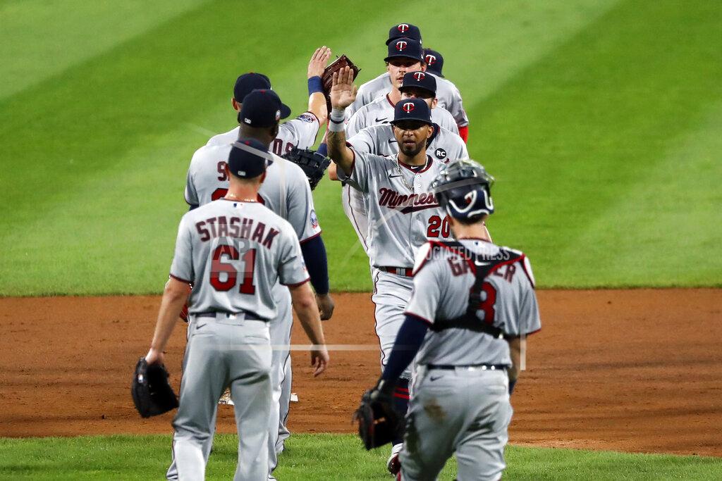 Charles Rex Arbogast The Minnesota Twins celebrate the team's 10-5 win over the Chicago White Sox after a baseball game, Friday, July 24, 2020, in Chicago. (AP Photo/Charles Rex Arbogast)