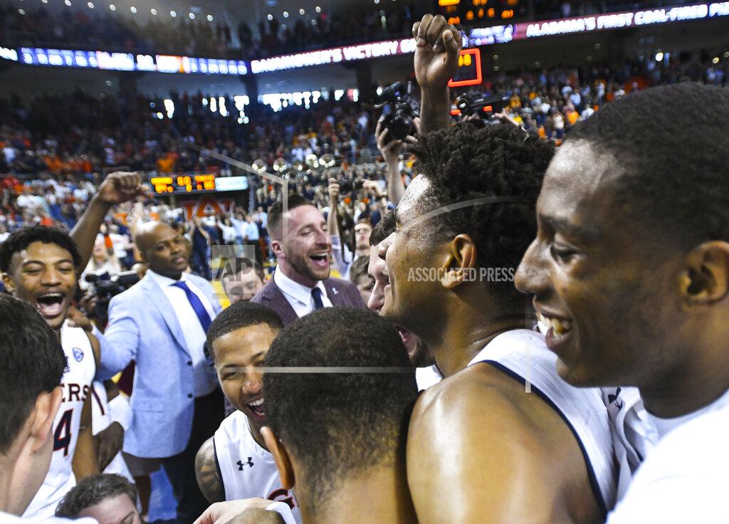 Julie Bennett Auburn celebrates the Tigers' 84-80 win over Tennessee after an NCAA college basketball game Saturday, March 9, 2019, in Auburn, Ala. (AP Photo/Julie Bennett)