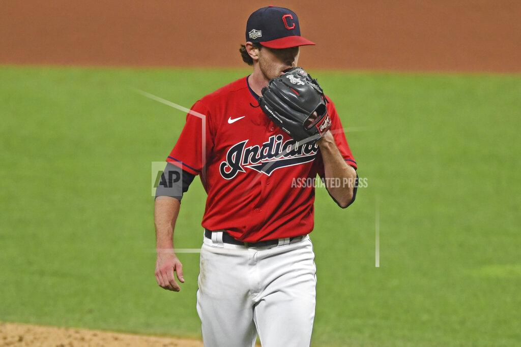 David Dermer Cleveland Indians starting pitcher Shane Bieber (57) walks to the dugout in the fourth inning of Game 1 of an American League wild-card baseball series against the New York Yankees, Tuesday, Sept. 29, 2020, in Cleveland. (AP Photo/David Dermer)