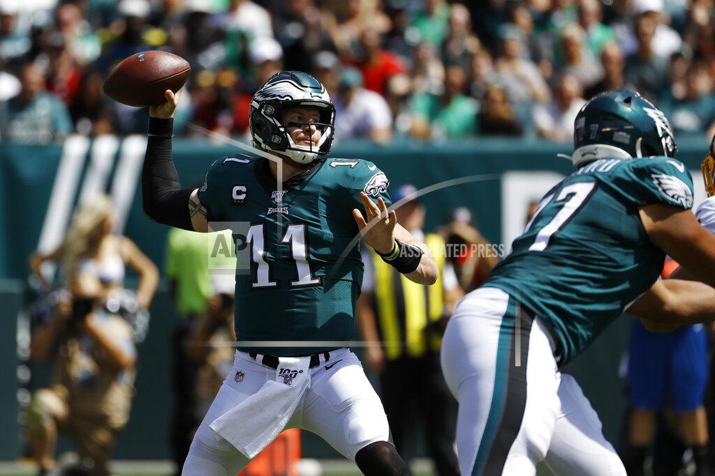 Michael Perez Philadelphia Eagles' Carson Wentz passes during the first half of an NFL football game against the Washington Redskins, Sunday, Sept. 8, 2019, in Philadelphia. (AP Photo/Michael Perez)