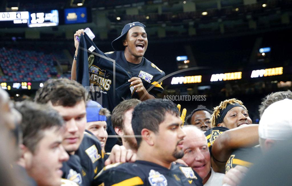 Gerald Herbert Appalachian State wide receiver Dysaun Razzak celebrates with his team after their victory over Middle Tennessee in the New Orleans Bowl NCAA college football game in New Orleans, Saturday, Dec. 15, 2018. Appalachian State won 45-13. (AP Photo/Gerald Herbert)