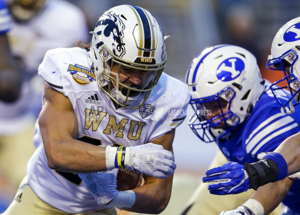 Steve Conner Western Michigan running back Chase Brown (28) runs up against the BYU defense on the goal line during the second half of the Famous Idaho Potato Bowl an NCAA college football game Friday, Dec. 21, 2018, in Boise, Idaho. BYU won 49-18. (AP Photo/Steve Conner)
