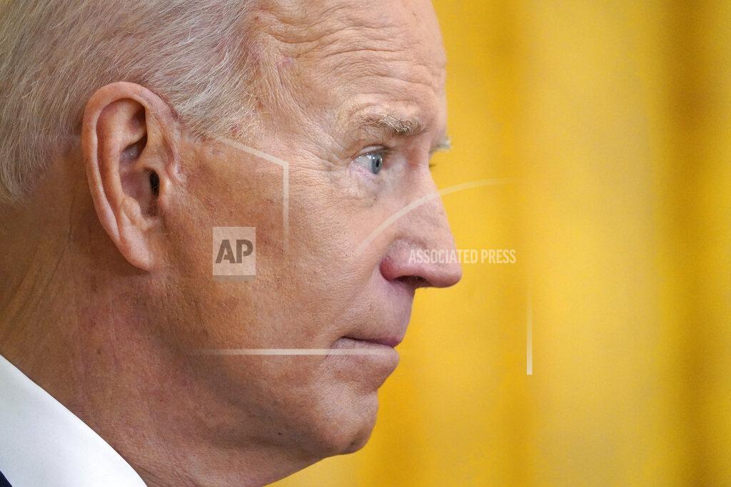 Evan Vucci President Joe Biden listens to a question during a news conference in the East Room of the White House, Thursday, March 25, 2021, in Washington. (AP Photo/Evan Vucci)