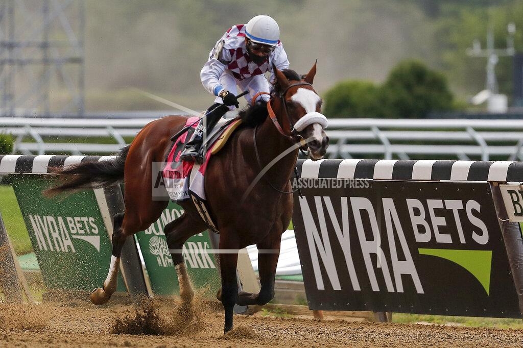 Seth Wenig Tiz the Law (8), with jockey Manny Franco up, crosses the finish line to win the152nd running of the Belmont Stakes horse race, Saturday, June 20, 2020, in Elmont, N.Y. (AP Photo/Seth Wenig)