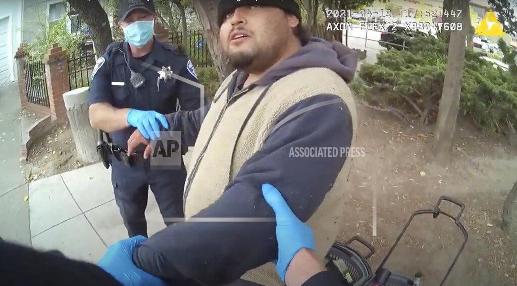 Uncredited In this image taken from Alameda Police Department body camera video, Alameda Police Department officers attempt to take 26-year-old Mario Gonzalez into custody, April 19, 2021, in Alameda, Calif. The video goes on to show officers pinning Gonzalez to the ground during the arrest that ended in his death. (Alameda Police Department via AP)
