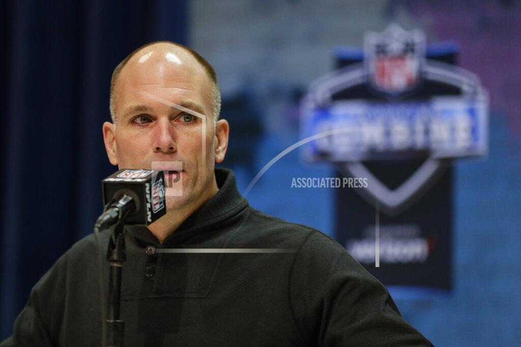 Michael Conroy Baltimore Ravens Eexecutive vice president and general manager Eric DeCosta speaks during a press conference at the NFL football scouting combine in Indianapolis, Tuesday, Feb. 25, 2020. This year's draft season featured the return of comparison shopping and face-to-face contact with college prospects a year after the NFL scouting combine was scuttled by the pandemic. Ravens GM Eric DeCosta is among those who insist there's no substitute for the in-person interaction at the combine for the people who are ultimately making draft day decisions.(AP Photo/Michael Conroy, File)