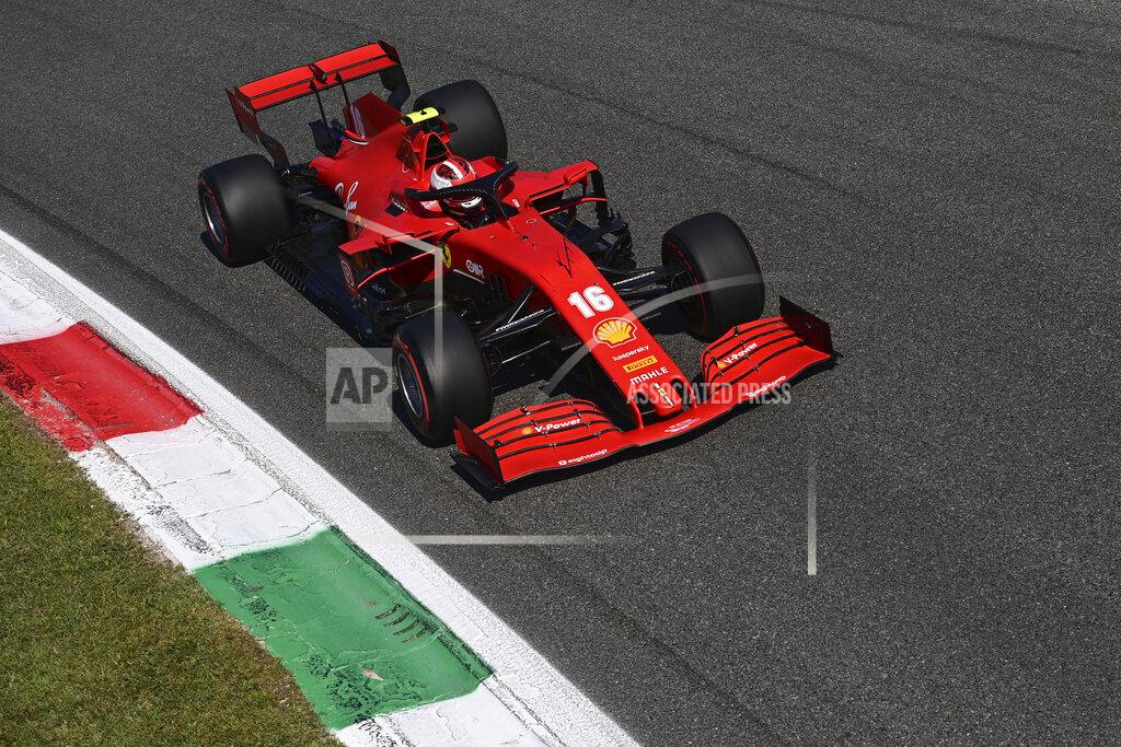 Miguel Medina Ferrari driver Charles Leclerc of Monaco steers his car during the qualifying session at the Monza racetrack in Monza, Italy, Saturday, Sept.5, 2020. The Italian Formula One Grand Prix will be held on Sunday. (Miguel Medina, Pool via AP)