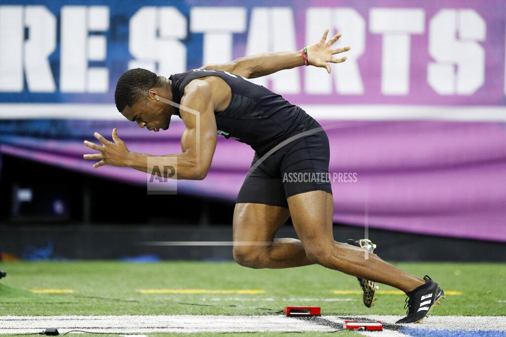 Charlie Neibergall Ohio State defensive back Jeff Okudah runs the 40-yard dash at the NFL football scouting combine in Indianapolis, Sunday, March 1, 2020. (AP Photo/Charlie Neibergall)