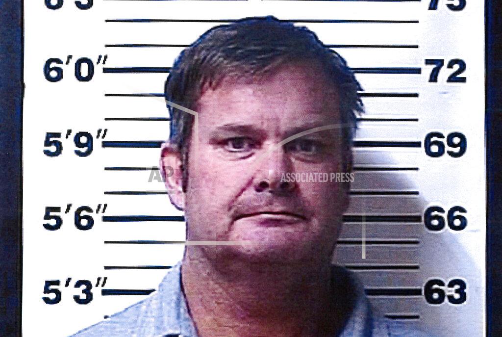 FILE - This file booking photo provided by the Rexburg, Idaho, Police Department shows Chad Daybell, who was arrested Tuesday, June 9, 2020, on suspicion of concealing or destroying evidence after local and federal investigators searched his property, according to the Fremont County Sheriff's Office. An Idaho judge says Daybell and his wife charged with conspiring to hide the bodies of her two missing children will stand trial together, rather than having two separate cases. Judge Steven Boyce also said Thursday, Oct. 29, 2020, that the Daybell's attorneys could ask to have the cases severed in the future if they feel their clients won't get fair treatment in a joint proceeding. (Rexburg Police Department via AP, File)