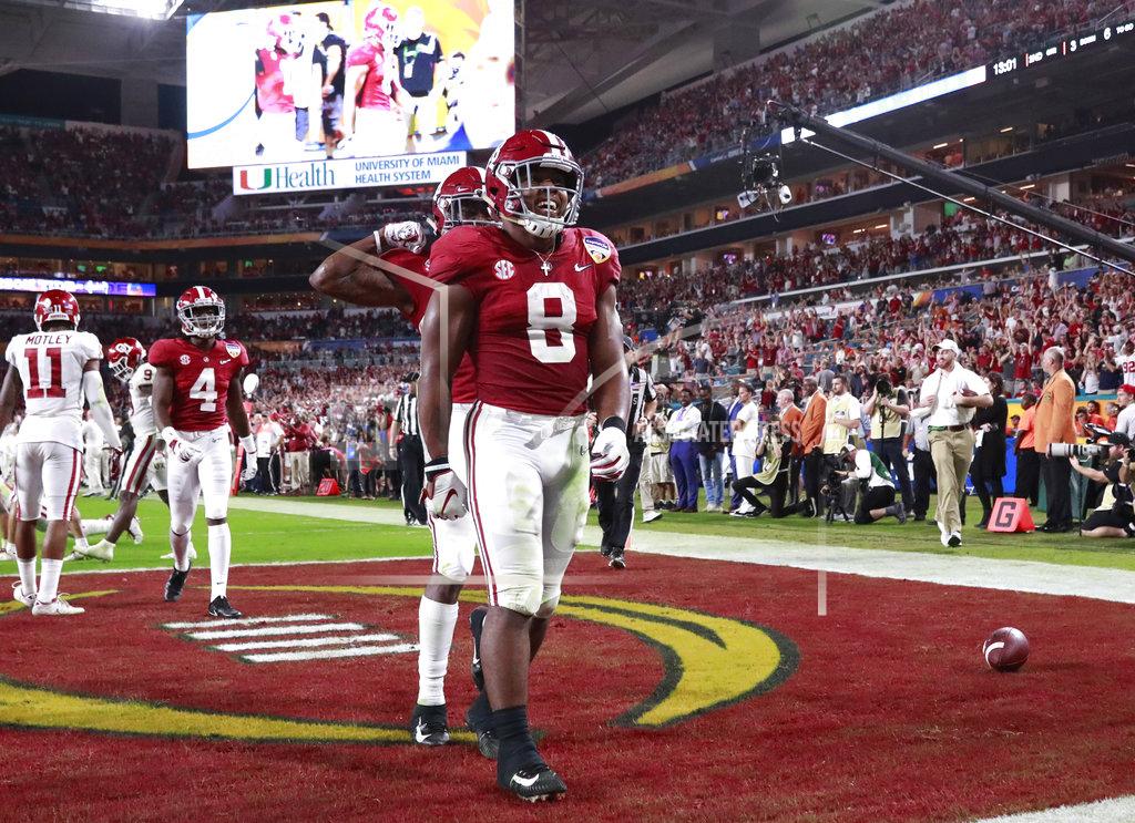 Wilfredo Lee Alabama running back Josh Jacobs (8) celebrates his touchdown, during the first half of the Orange Bowl NCAA college football game against Oklahoma , Saturday, Dec. 29, 2018, in Miami Gardens, Fla. (AP Photo/Wilfredo Lee)