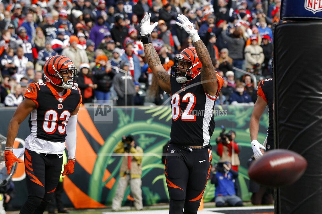 Frank Victores Cincinnati Bengals tight end Cethan Carter (82) celebrates his touchdown in the first half of an NFL football game against the New England Patriots, Sunday, Dec. 15, 2019, in Cincinnati. (AP Photo/Frank Victores)