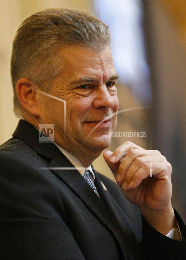 Steve Helber FILE This Feb. 20, 2019 file photo shows former Virginia House speaker, Kirk Cox, R-Colonial Heights, as he listens to speeches on the floor of the House during the House session at the Capitol in Richmond, Va. The GOP gubernatorial candidate will be chosen during the party's May 8, 2021 nominating convention. (AP Photo/Steve Helber)