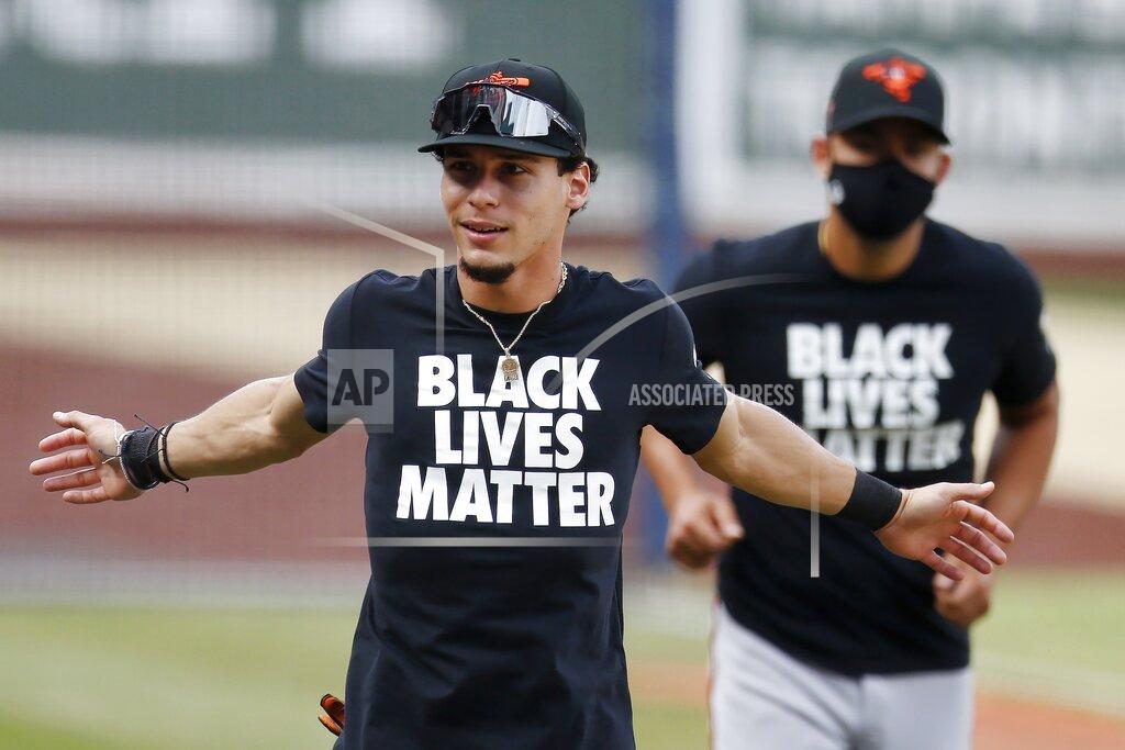 Michael Dwyer Baltimore Orioles' Andrew Velazquez warms up in a Black Lives Matter jersey before an opening day baseball game against the Boston Red Sox at Fenway Park, Friday, July 24, 2020, in Boston. (AP Photo/Michael Dwyer)