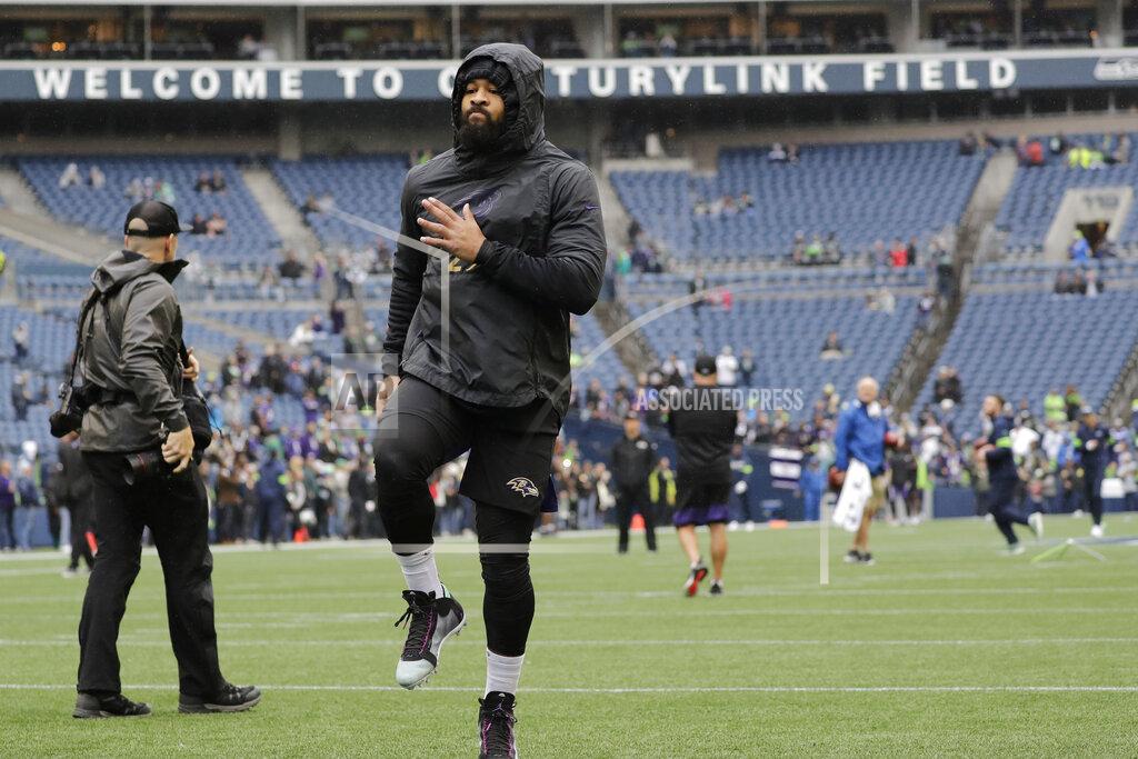 Elaine Thompson Baltimore Ravens free safety Earl Thomas, center, warms up before an NFL football game against his former team, the Seattle Seahawks, Sunday, Oct. 20, 2019, in Seattle. (AP Photo/Elaine Thompson)