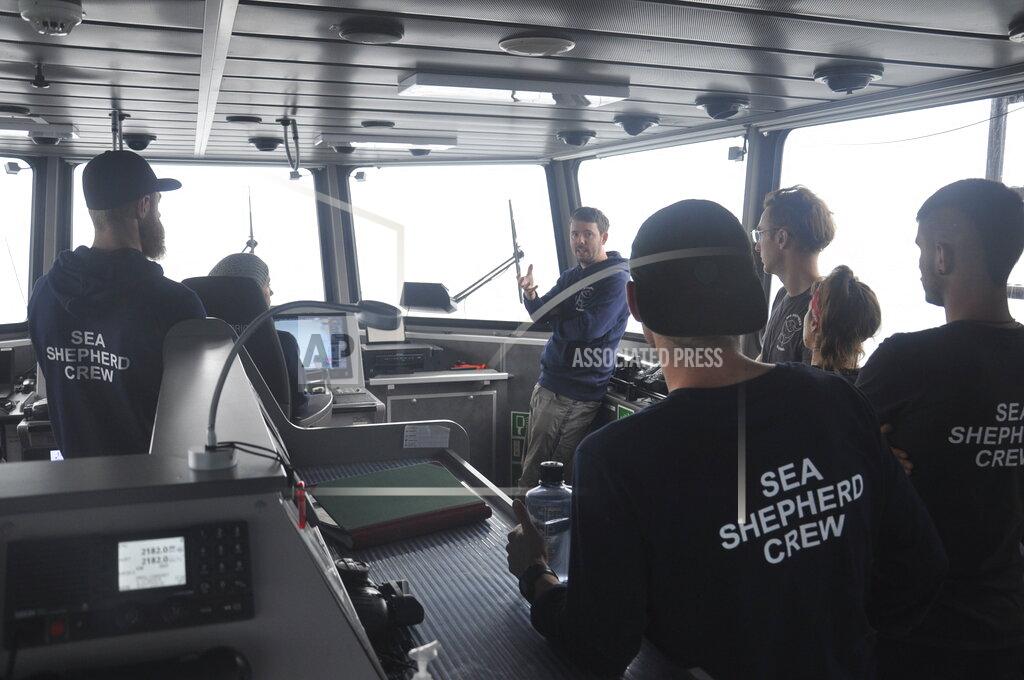 Joshua Goodman Capt. Peter Hammarstedt, campaign director of Sea Shepherd, addresses the crew of the Ocean Warrior on July 13, 2021, during its 18-day high seas voyage to inspect the Chinese overseas fleet as it fishes for squid off the west coast of South America. Hammarstedt says, “Beijing is exporting its overfishing problem to South America.” (AP Photo/Joshua Goodman)