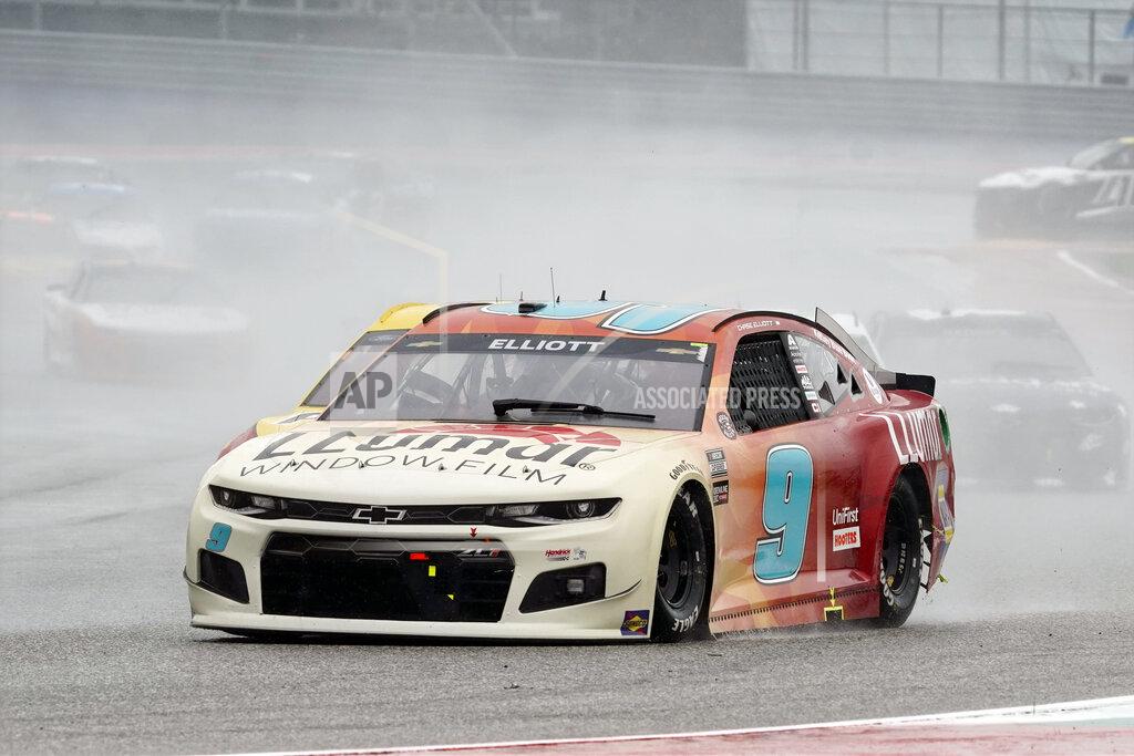 Chuck Burton Chase Elliott (9) leads cars into Turn 13 during a NASCAR Cup Series auto race at Circuit of the Americas in Austin, Texas, Sunday, May 23, 2021. (AP Photo/Chuck Burton)