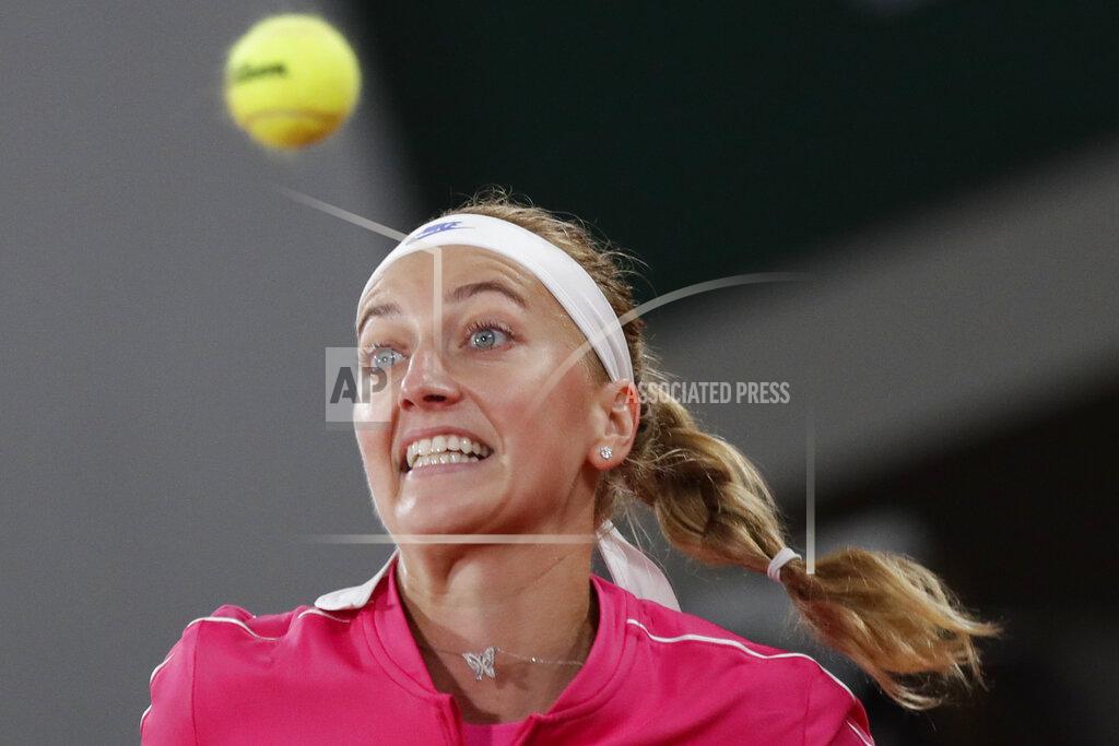 Alessandra Tarantino Petra Kvitova of the Czech Republic plays a shot against France's Oceane Dodin in the first round match of the French Open tennis tournament at the Roland Garros stadium in Paris, France, Monday, Sept. 28, 2020. (AP Photo/Alessandra Tarantino)