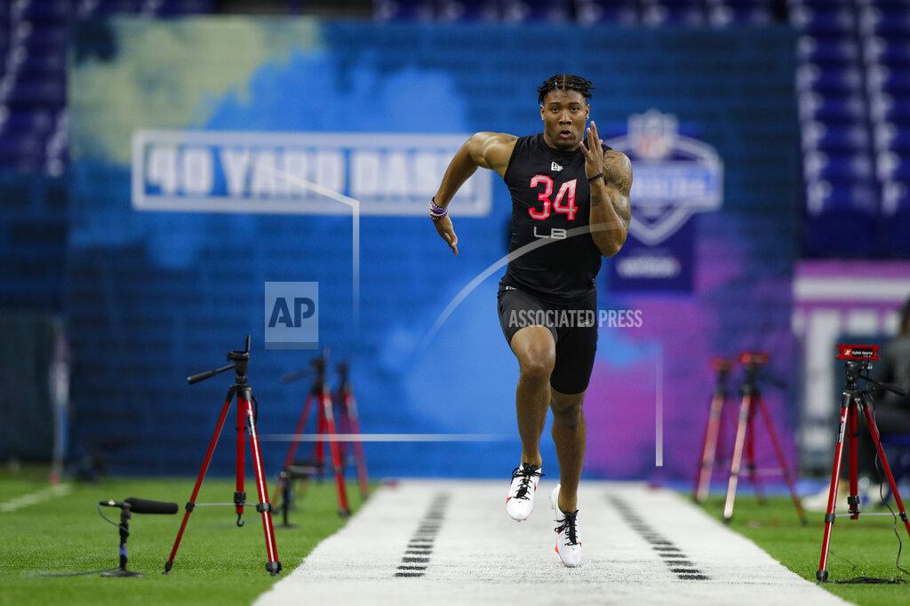 Michael Conroy Clemson linebacker Isaiah Simmons runs the 40-yard dash at the NFL football scouting combine in Indianapolis, Saturday, Feb. 29, 2020. (AP Photo/Michael Conroy)