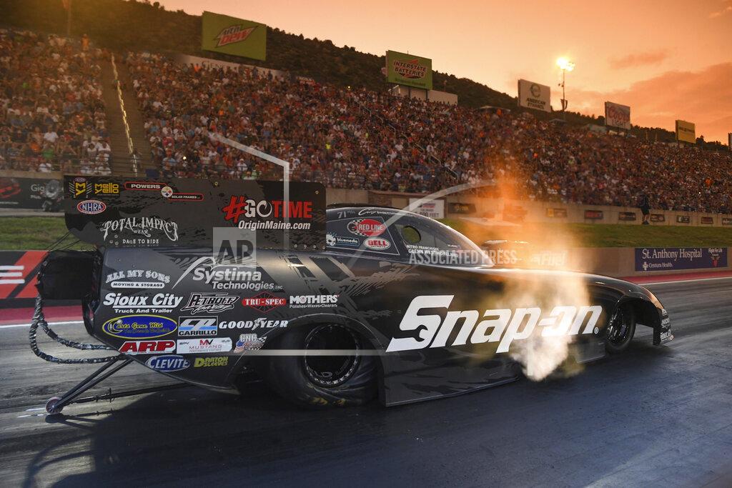 Jerry Foss In this photo provided by the NHRA, Cruz Pedregon drives in Funny Car qualifying at the Dodge Mile-High NHRA Nationals drag races at Bandimere Speedway on Friday, July 19, 2019, in Morrison, Colo. (Jerry Foss/NHRA via AP)