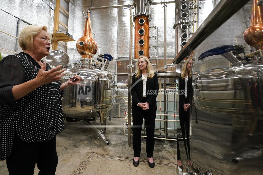 Steve Helber In this Monday, June 7, 2021, photo Rep Abigail Spanberger, D-Va., right, listens to distiller Sherry Brockenbrough, during a tour of the Hilltop distillery in Maidens, Va. Spanberger held a roundtable discussion with distillers to discuss COVID-19 reopening challenges experienced by small businesses & regulatory issues facing central Virginia distilleries. (AP Photo/Steve Helber)