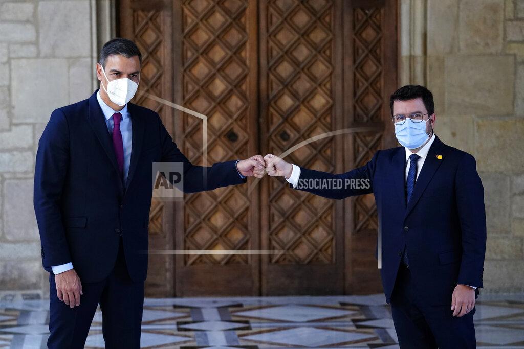 Joan Mateu Parra Spanish Prime Minister Pedro Sanchez and Catalonian regional president Pere Aragonès, right, meet at the headquarter of the Government of Catalonia in Barcelona, Spain, Wednesday, Sept. 15, 2021. Spain's prime minister and the leader of Catalonia are restarting negotiations in hopes of finding a solution to the ongoing political crisis caused by the region's separatist movement. (AP Photo/Joan Mateu Parra)