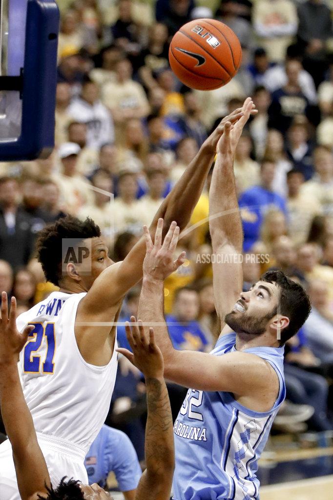 Keith Srakocic North Carolina's Luke Maye, right, shoots as Pittsburgh's Terrell Brown (21) defends during the second half of an NCAA college basketball game, Saturday, Jan. 5, 2019, in Pittsburgh. (AP Photo/Keith Srakocic)