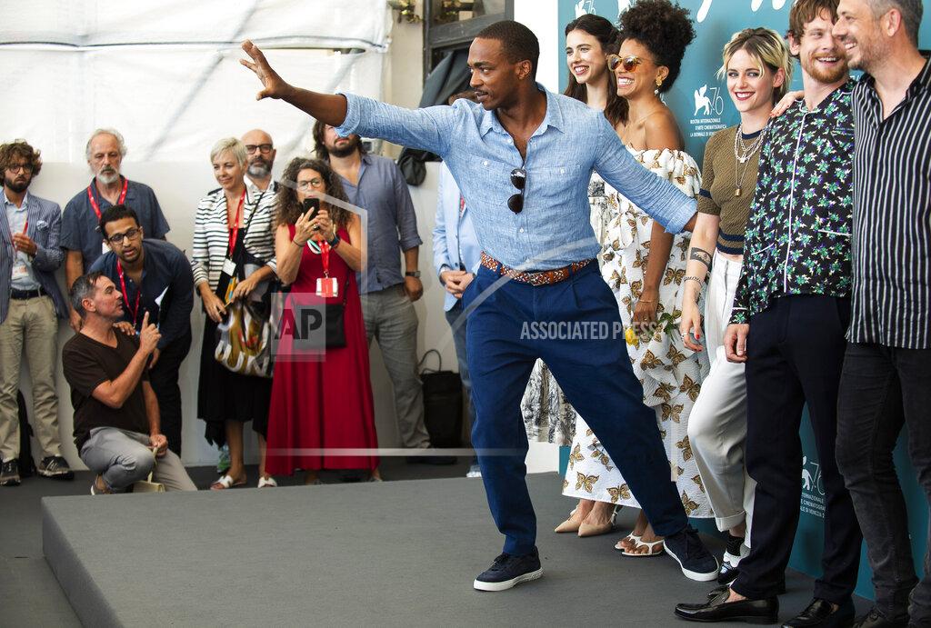 Arthur Mola File - Actor Anthony Mackie gestures to photographers at the photo call for the film 'Seberg' at the Venice Film Festival. The 77th Venice Film Festival will kick off on Wednesday, Sept. 2, 2020, but this year's edition will be unlike any others. Coronavirus restrictions will mean fewer Hollywood stars, no crowds interacting with actors and other virus safeguards will be deployed. (Photo by Arthur Mola/Invision/AP, File)