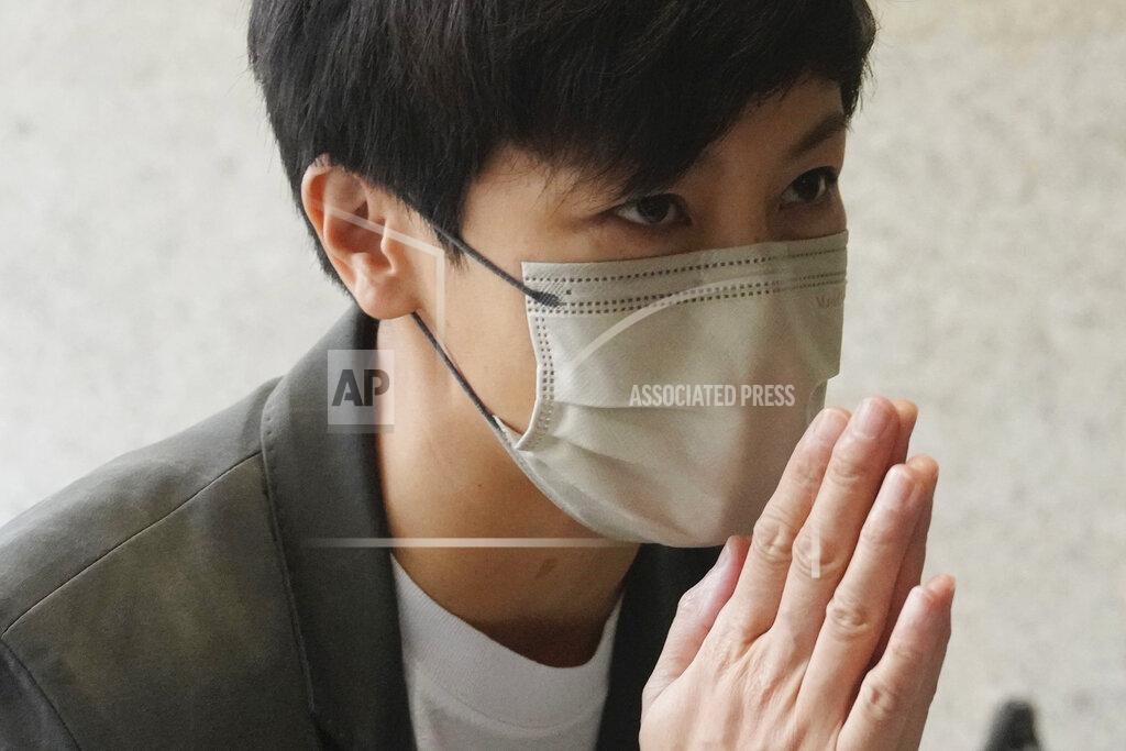 Kin Cheung Hong Kong singer Denise Ho arrives for an appearance at a court in Hong Kong as she is charged in relation to their past fundraising for activists, Tuesday, May 24, 2022. (AP Photo/Kin Cheung)