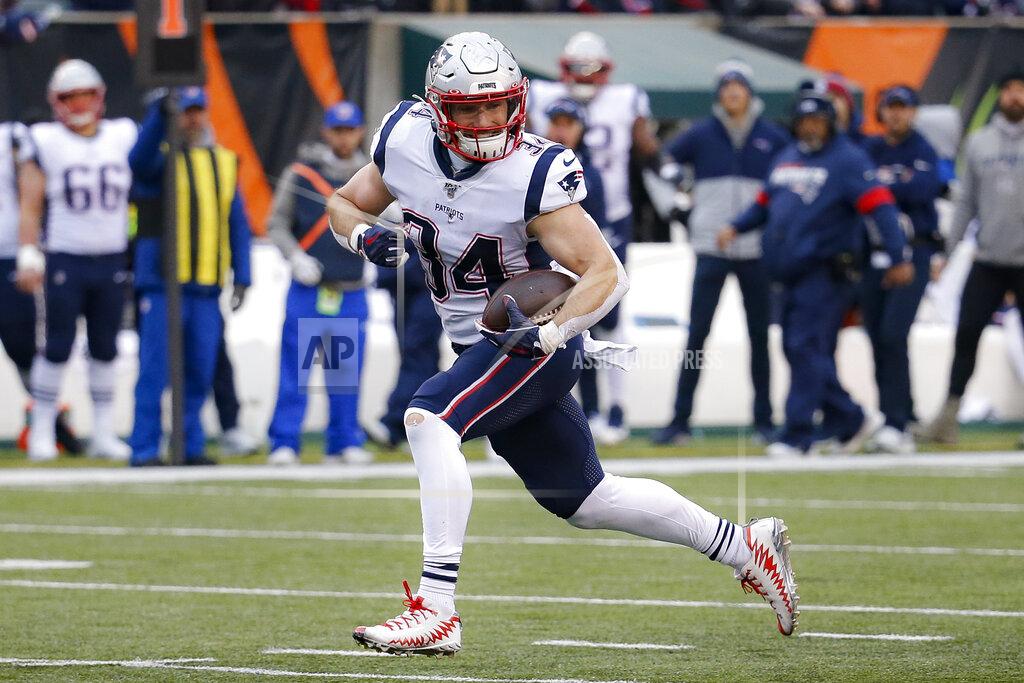 Frank Victores New England Patriots running back Rex Burkhead runs in a touchdown in the second half of an NFL football game against the Cincinnati Bengals, Sunday, Dec. 15, 2019, in Cincinnati. (AP Photo/Frank Victores)
