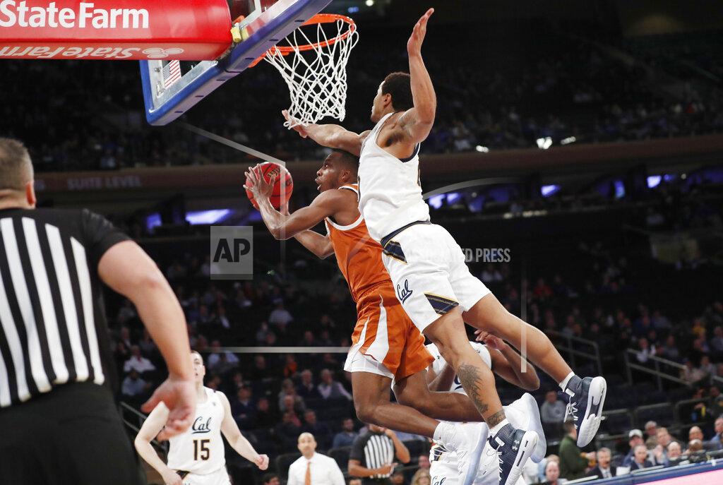 Kathy Willens California guard Matt Bradley, right, defends Texas guard Matt Coleman III during the second half of an NCAA college basketball game in the 2K Empire Classic, Friday, Nov. 22, 2019, in New York. Texas defeated California 62-45. (AP Photo/Kathy Willens)