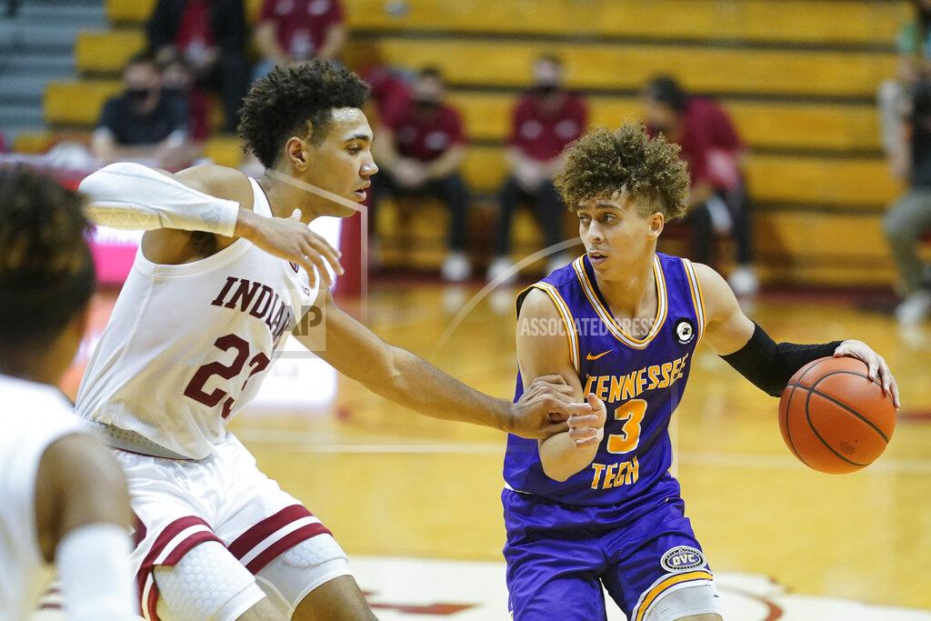 Darron Cummings Tennessee Tech's Keishawn Davidson (3) is defended by Indiana's Trayce Jackson-Davis (23) during the second half of an NCAA college basketball game, Wednesday, Nov. 25, 2020, in Bloomington, Ind. (AP Photo/Darron Cummings)
