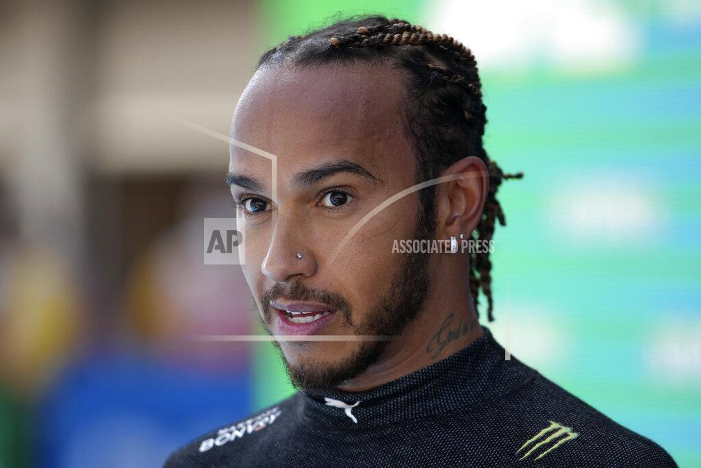 Emilio Morenatti Mercedes driver Lewis Hamilton of Britain talks after he clinched his 100th pole position by clocking the fastest time in the qualifying for the Spanish Formula One Grand Prix at the Barcelona Catalunya racetrack in Montmelo, just outside Barcelona, Spain, Saturday, May 8, 2021. The Spanish Grand Prix will be held on Sunday. (AP Photo/Emilio Morenatti, Pool)