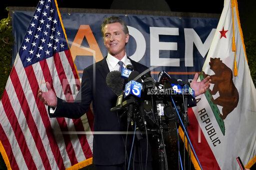 FILE - In this Sept. 14, 2021, file photo, California Gov. Gavin Newsom addresses reporters after beating back the recall attempt that aimed to remove him from office, in Sacramento, Calif. California Republicans are looking to quickly move on from a recall election that saw Gov. Newsom reinforce his political clout and add to the long list of Election Day disappointments for the state GOP. A three-day convention of party delegates that starts Friday, Sept. 24, 2021, will include its share of soul searching and finger-pointing, with the party facing the truth that Republicans have been unable to win a statewide race in California since 2006. (AP Photo/Rich Pedroncelli, File)
