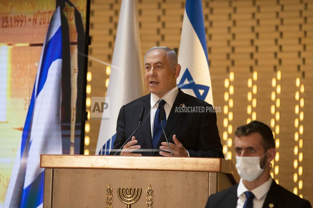 Maya Alleruzzo FILE - In this Wednesday, April 14, 2021 file photo, Israeli Prime Minister Benjamin Netanyahu speaks at a Memorial Day ceremony at the military cemetery at Mount Herzl, Jerusalem. Netanyahu faces a midnight deadline on Tuesday, May 4, to put together a new coalition government. If he fails, he faces the possibility of leading his Likud party into the opposition for the first time in 12 years. (AP Photo/Maya Alleruzzo, Pool, File)