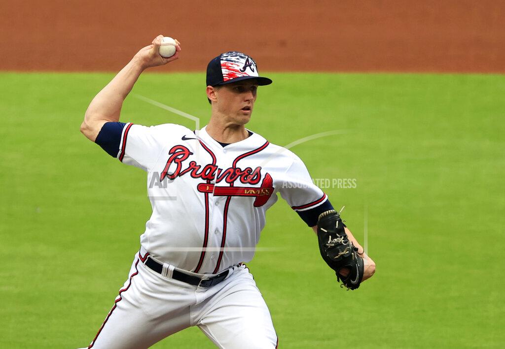 Butch Dill Atlanta Braves starting pitcher Kyle Wright throws during the first inning of a baseball game Monday, July 4, 2022, in Atlanta. (AP Photo/Butch Dill)
