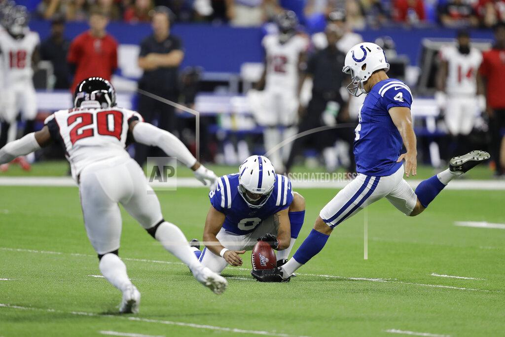 Darron Cummings Indianapolis Colts kicker Adam Vinatieri (4) kicks a field goal out of the hold of punter Rigoberto Sanchez (8) during the first half of an NFL football game against the Atlanta Falcons, Sunday, Sept. 22, 2019, in Indianapolis. (AP Photo/Darron Cummings)