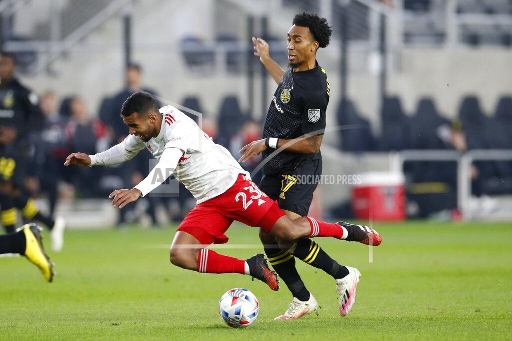 Jay Laprete New York Red Bulls' Cristian Casseres, left, and Columbus Crew's Marlon Hairston collide during the first half of an MLS soccer match Saturday, Oct. 23, 2021, in Columbus, Ohio. (AP Photo/Jay LaPrete)
