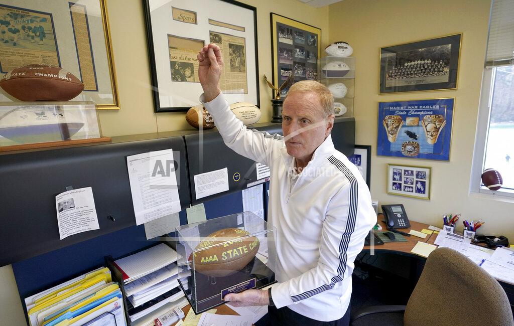 David J. Phillip Marist School football coach Alan Chadwick talks about Los Angeles Rams coach Sean McVay's high school career at Marist during an interview for the NFL Super Bowl 53 football game Friday, Feb. 1, 2019, in Atlanta. McVay was the starting quarterback his senior year at Marist when the team won the state championship in 2003. (AP Photo/David J. Phillip)