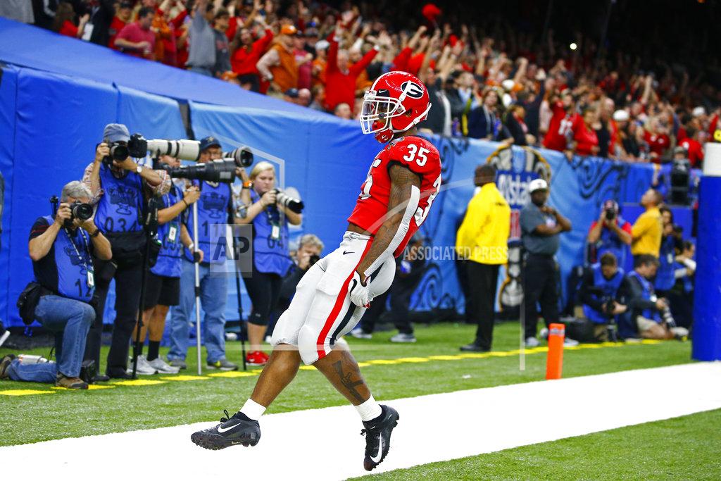 Butch Dill Georgia running back Brian Herrien scores a touchdown during the first half of the Sugar Bowl NCAA college football game against Texas in New Orleans, Tuesday, Jan. 1, 2019. (AP Photo/Butch Dill)