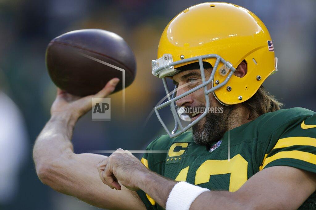 Matt Ludtke Green Bay Packers' Aaron Rodgers warms up before an NFL football game against the Washington Football Team Sunday, Oct. 24, 2021, in Green Bay, Wis. (AP Photo/Matt Ludtke)