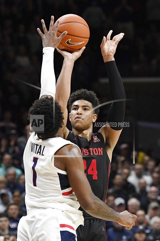 Jessica Hill Houston's Quentin Grimes (24) shoots against Connecticut's Christian Vital (1) in the second half of an NCAA college basketball game, Thursday, March 5, 2020, in Storrs, Conn. (AP Photo/Jessica Hill)