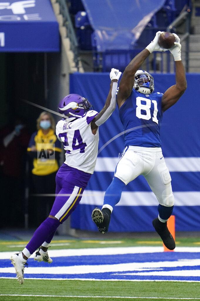 Michael Conroy Indianapolis Colts tight end Mo Alie-Cox (81) makes a catch against Minnesota Vikings' Holton Hill (24) during the second half of an NFL football game, Sunday, Sept. 20, 2020, in Indianapolis. (AP Photo/Michael Conroy)