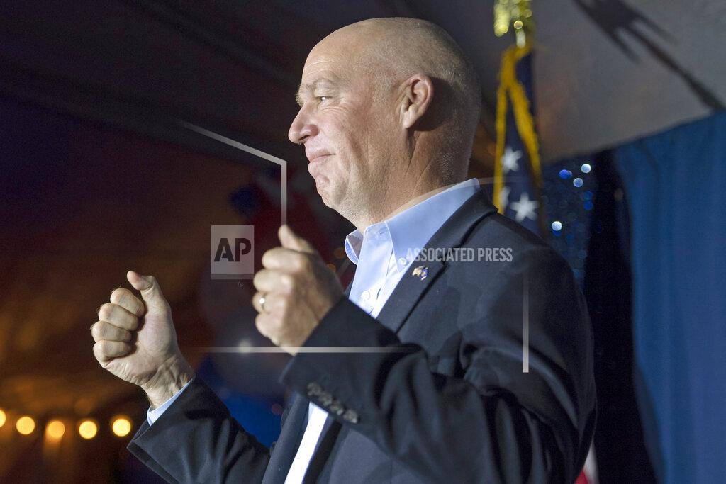Tommy Martino FILE - In this Nov. 3, 2020, file photo, Greg Gianforte, Republican candidate for Montana governor, reacts after winning the election in Bozeman, Mont. Republican lawmakers in Montana are pushing a series of bills that would limit abortion access and remove gun restrictions, hoping to capitalize on GOP control following the November election. Montana has a Republican governor for the first time in 16 years, opening the door to pass into law bills previously vetoed by Democratic governors. (AP Photo/Tommy Martino, File)