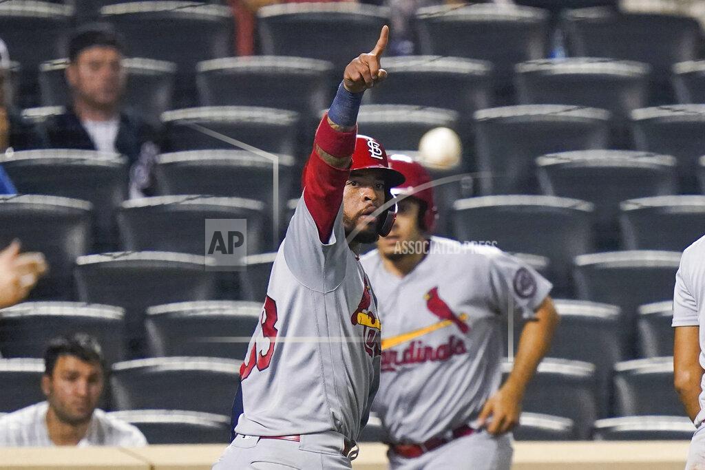 Frank Franklin Ii St. Louis Cardinals' Edmundo Sosa (63) gestures to Andrew Knizner at first base after scoring on a two-run single by Knizner during the 11th inning of the team's baseball game against the New York Mets on Tuesday, Sept. 14, 2021, in New York. (AP Photo/Frank Franklin II)