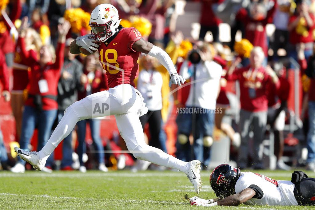 Charlie Neibergall Iowa State wide receiver Hakeem Butler (18) runs from Texas Tech defensive back Damarcus Fields during a 48-yard touchdown reception in the second half of an NCAA college football game, Saturday, Oct. 27, 2018, in Ames, Iowa. Iowa State won 40-31. (AP Photo/Charlie Neibergall)